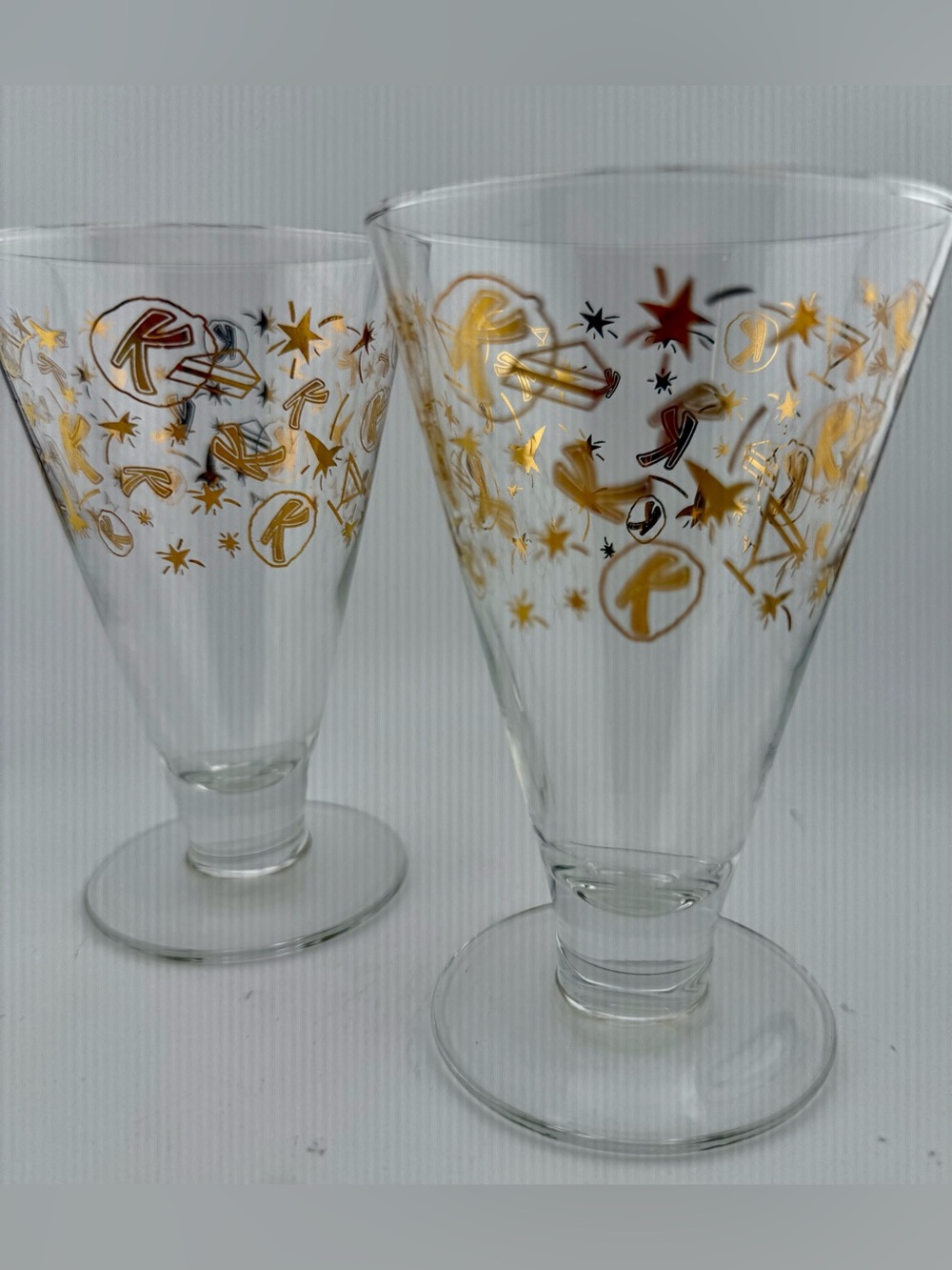 2 Kahlúa footed cocktail/mudslie glasses gold  "K", stars, & rockets. 9oz